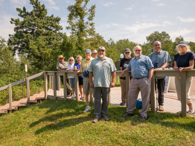 Friends board members, NPS Director Chuck Sams and Superintendent Lynne Dominy at top of Meyers Beach stairs - NPS photo
