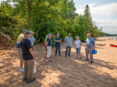 Friends board members talk with NPS Director Chuck Sams on Meyers Beach - NPS photo