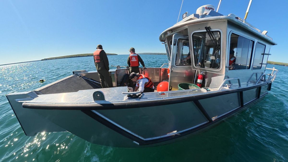 Buoy recovery crew working on the foredeck - Jon Okerstrom photo